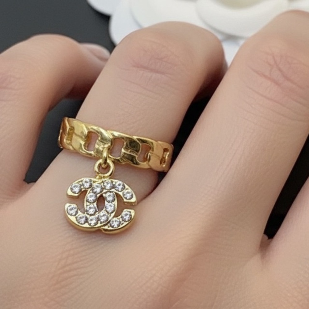 CHANEL Gold Ring with Crystal Charm